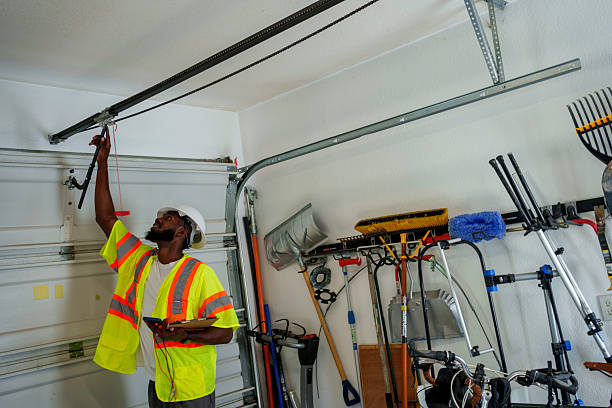 Professional Garage Door Panel Replacement technician working in Arkoma, OK
