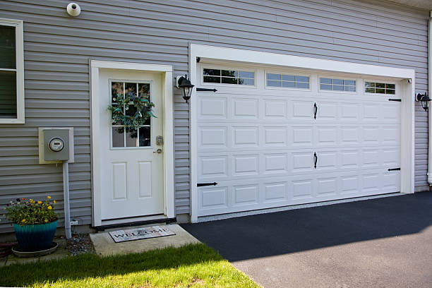 24/7 Emergency Garage Door Panel Replacement experts in Arkoma, OK